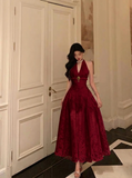 Vintage-Inspired Deep V-Neck Halter Velvet Evening Gown with Floral Brooch