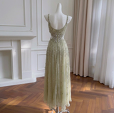 A sparkling, embellished evening gown with intricate beaded detailing