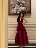 Vintage-Inspired Deep V-Neck Halter Velvet Evening Gown with Floral Brooch