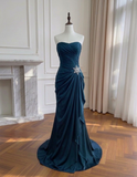 Elegant Midnight Blue Ruched Strapless Evening Gown with Snowflake Crystal Brooch